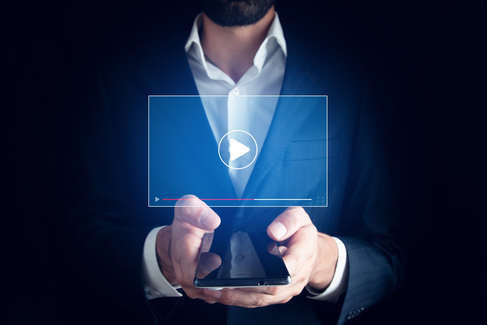 Man holding tablet and watching video